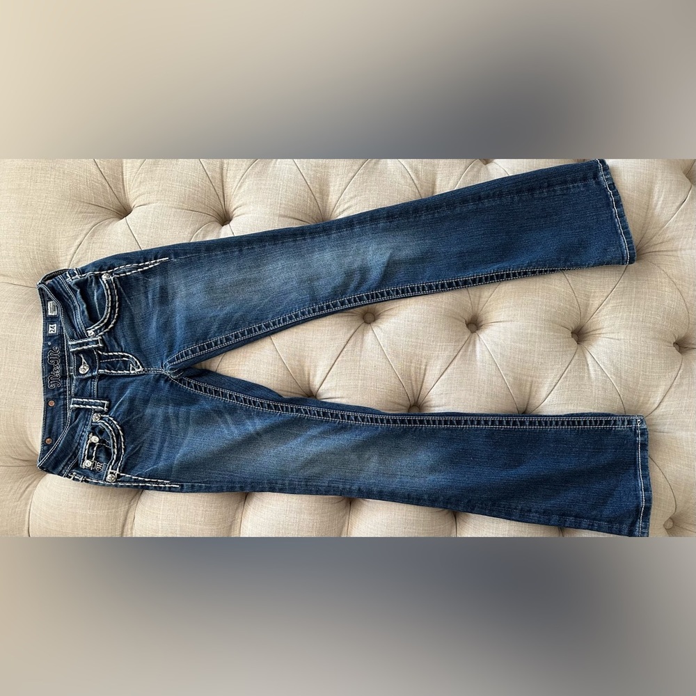 Miss Me low rise Signature Boot cut jeans.  Size 24  In great used condition.